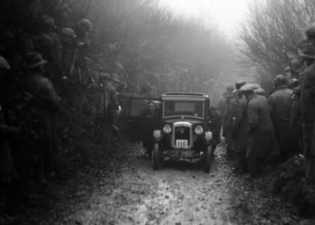 Austin top hat saloon of EC Smyth competing in the MCC Exeter Trial, Meerhay, Dorset, 1930. Artist: Bill Brunell.