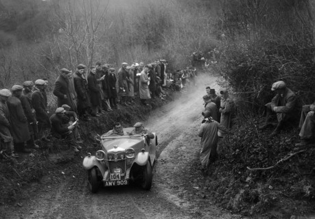 Riley Lynx open 4-seater of VNG Seeney competing in the MCC Lands End Trial, 1935. Artist: Bill Brunell.