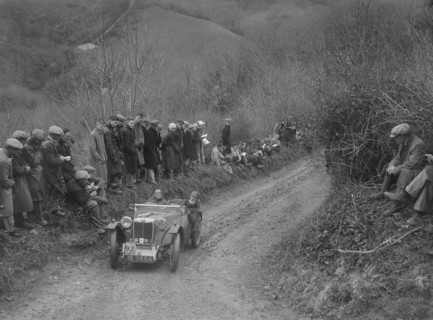 MG PA of Jack Bastock of the Cream Cracker Team competing in the MCC Lands End Trial, 1935. Artist: Bill Brunell.