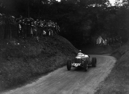 Riley competing in the Shelsley Walsh Hillclimb, Worcestershire, 1935. Artist: Bill Brunell.