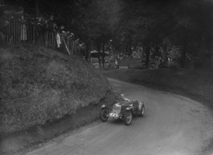 Riley TT Sprite competing in the Shelsley Walsh Hillclimb, Worcestershire, 1935. Artist: Bill Brunell.