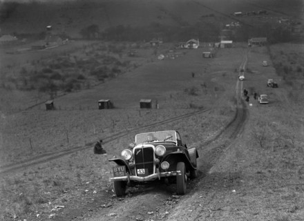 Jensen V8 competing in the London Motor Club Coventry Cup Trial, Knatts Hill, Kent, 1938. Artist: Bill Brunell.