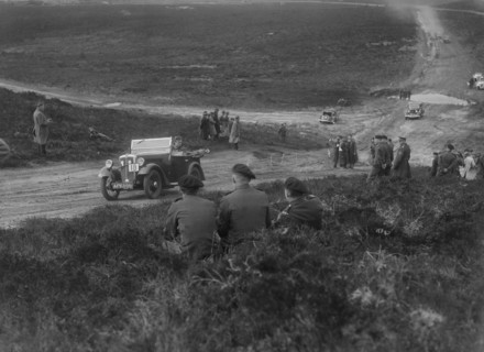 Morris Minor competing in a motoring trial, Bagshot Heath, Surrey, 1930s. Artist: Bill Brunell.