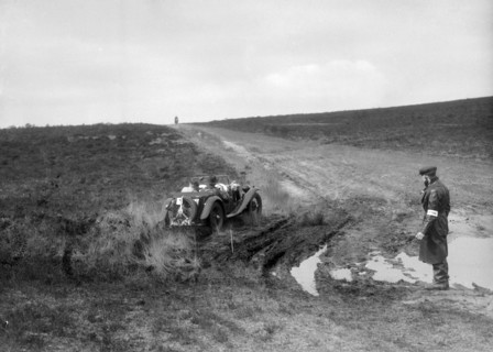 Swept-wing MG J2 competing in a motoring trial, Bagshot Heath, Surrey, 1930s. Artist: Bill Brunell.