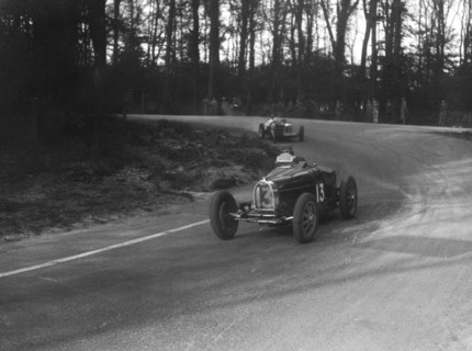 Bugatti Type 35B of Jock Leith leading a Riley Brooklands at Donington Park, Leicestershire, 1935. Artist: Bill Brunell.