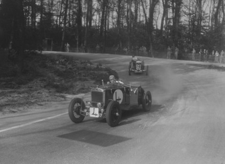 Two Frazer-Nash cars racing at Donington Park, Leicestershire, 1930s. Artist: Bill Brunell.