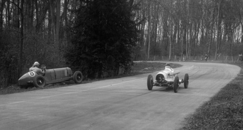 Hector Dobbs Riley Dobbs offset special passing Raymond Mays' crashed ERA, Donington Park, 1935. Artist: Bill Brunell.