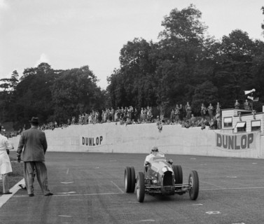Bert Hadley's Austin7 works racer competing at Crystal Palace, London, 1939. Artist: Bill Brunell.