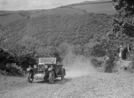 Riley 9 open 4-seater tourer at the Mid Surrey AC Barnstaple Trial, Beggars Roost, Devon, 1934. Artist: Bill Brunell.