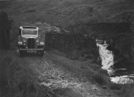 Kitty Brunell road testing a Standard Little Twelve saloon, c1932. Artist: Bill Brunell.