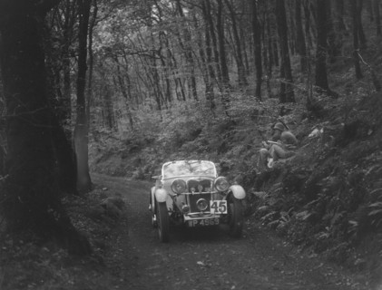 1933 Singer competing in the Mid Surrey AC Barnstaple Trial, 1934. Artist: Bill Brunell.