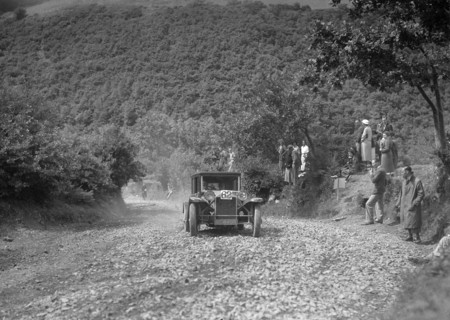 Lancia Lambda saloon competing in the Mid Surrey AC Barnstaple Trial, Beggars Roost, Devon, 1934. Artist: Bill Brunell.