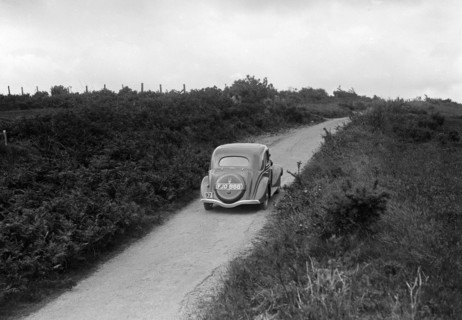 Ford V8 of Viscount Chetwynd competing in the MCC Torquay Rally, 1938. Artist: Bill Brunell.