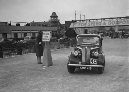 Standard saloon competing in the JCC Rally, Brooklands, Surrey, 1939. Artist: Bill Brunell.