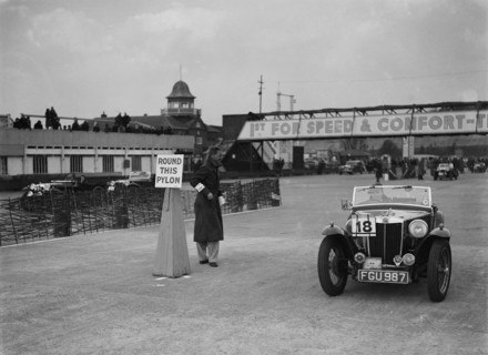 MG TA competing in the JCC Rally, Brooklands, Surrey, 1939. Artist: Bill Brunell.