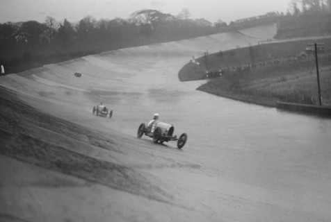 Two Bugattis racing at a BARC meeting, Brooklands, Surrey, 1931 Artist: Bill Brunell.