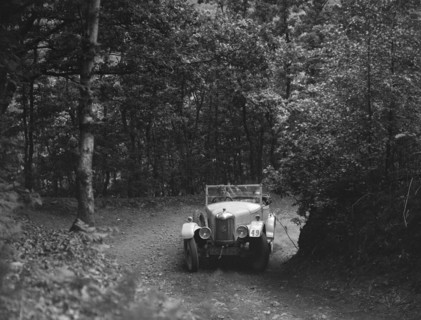 AC taking part in a motoring trial, c1930s. Artist: Bill Brunell.