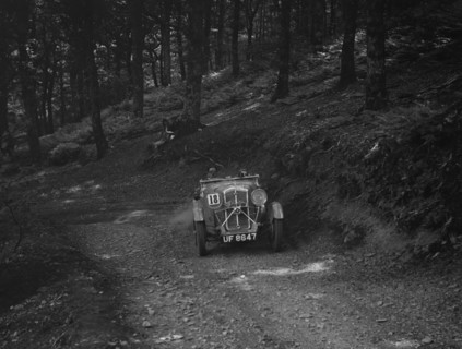 Wolseley Hornet of ARC Rigby taking part in a motoring trial, c1930s. Artist: Bill Brunell.