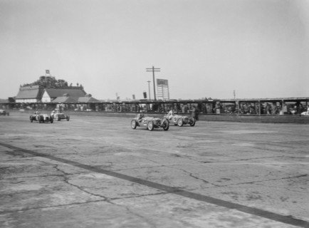 Rileys of Cyril Whitcroft and AG Miller competing in the BRDC 500 Mile Race, Brooklands, 1931. Artist: Bill Brunell.