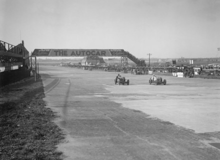 MG C types of the Earl of March and Harold Parker, BRDC 500 Mile Race, Brooklands, 1931. Artist: Bill Brunell.