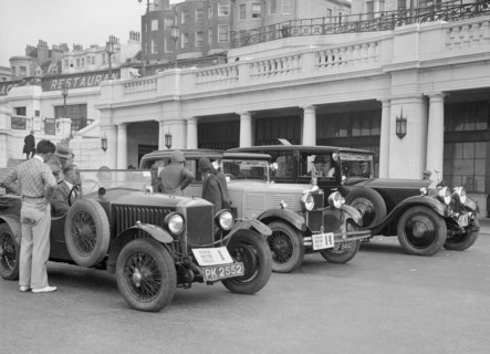 Invicta of DM Healey and a Standard Sportsman's saloon at the B&HMC Brighton Motor Rally, 1930. Artist: Bill Brunell.