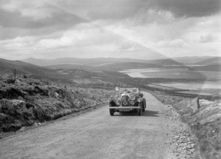 Lagonda open tourer of CG Seddon competing in the RSAC Scottish Rally, 1934. Artist: Bill Brunell.
