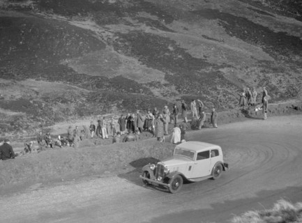 Austin 12/6 of JW Flewitt at the RSAC Scottish Rally, Devil's Elbow, Glenshee, 1934. Artist: Bill Brunell.