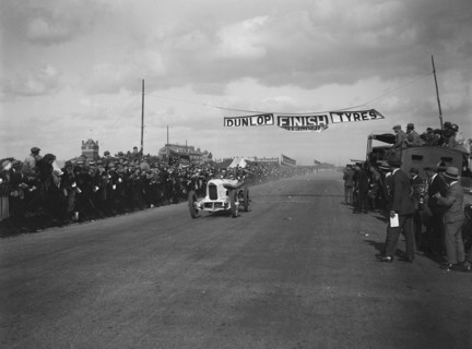 A Barlow's Benz 84hp at the finishing line, Southsea Speed Carnival, Hampshire, 1922. Artist: Bill Brunell.