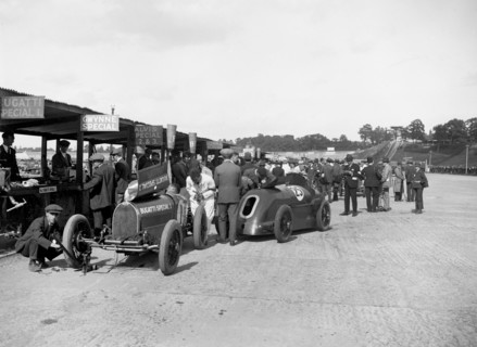 Bugatti Special 1 and Gwynne Special in the pits at a BARC meeting, Brooklands, 1933. Artist: Bill Brunell.