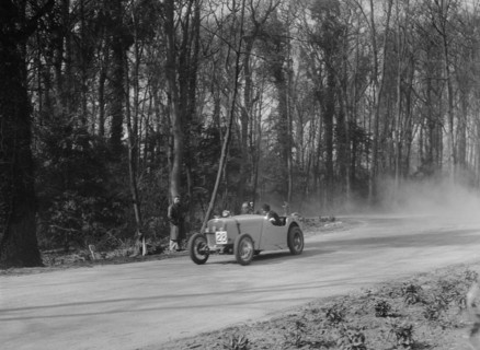 Singer of JR Baker at Coppice Corner, Donington Park, Leicestershire, 1933. Artist: Bill Brunell.