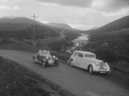Frazer-Nash BMW 319/55 of E Violet Watson passing Bill Brunell's Standard, Scottish Rally, 1938. Artist: Bill Brunell.