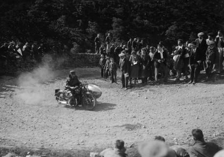 Rudge-Whitworth and sidecar of FV Garratt competing in the MCC Edinburgh Trial, 1930. Artist: Bill Brunell.