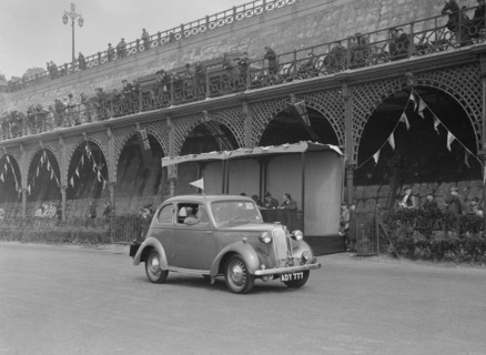 Vauxhall 10 of Miss IM Burton at the RAC Rally, Madeira Drive, Brighton, 1939. Artist: Bill Brunell.