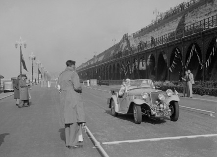 Singer Nine sports of CE Cole at the RAC Rally, Madeira Drive, Brighton, 1939. Artist: Bill Brunell.