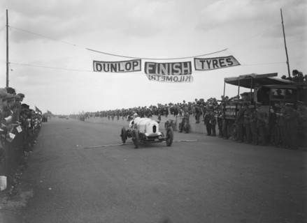 Bentley TT of Frank Clement at the finish of the Southsea Speed Carnival, Hampshire. 1922. Artist: Bill Brunell.