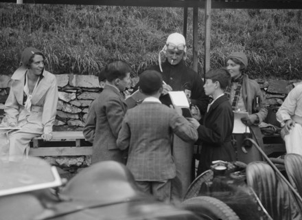 Goldie Gardner signing autographs at the Irish Grand Prix, Phoenix Park, Dublin, 1930. Artist: Bill Brunell.