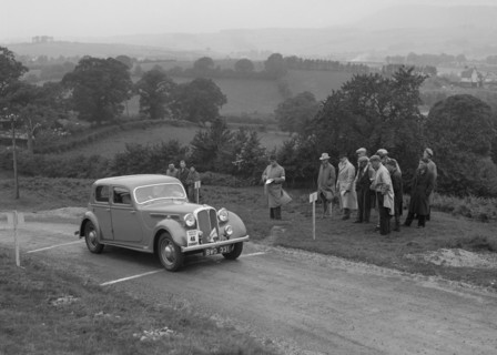 Rover saloon of WJH Davies competing in the South Wales Auto Club Welsh Rally, 1937 Artist: Bill Brunell.
