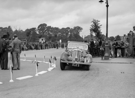 Rover 4-door saloon of FD Cooper competing in the South Wales Auto Club Welsh Rally, 1937 Artist: Bill Brunell.