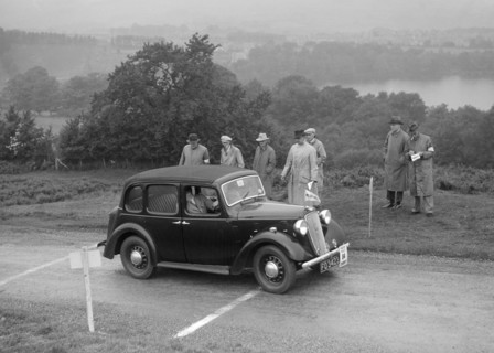 Austin Cambridge saloon of T Norton competing in the South Wales Auto Club Welsh Rally, 1937 Artist: Bill Brunell.