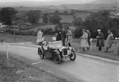 Austin 7 Nippy of DN Kennedy competing in the South Wales Auto Club Welsh Rally, 1937 Artist: Bill Brunell.