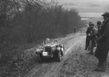 Singer 2-seater sports competing in a trial, Crowell Hill, Chinnor, Oxfordshire, 1930s. Artist: Bill Brunell.