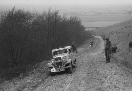 Standard Little Nine saloon competing in a trial, Crowell Hill, Chinnor, Oxfordshire, 1930s. Artist: Bill Brunell.