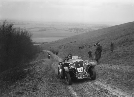 Singer 2-seater sports competing in a trial, Crowell Hill, Chinnor, Oxfordshire, 1930s. Artist: Bill Brunell.