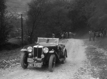 MG Magnette competing in a motoring trial, Nailsworth Ladder, Gloucestershire, 1930s.. Artist: Bill Brunell.