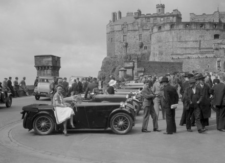 Kitty Brunell and her MG Magna on Castle Esplanade, Edinburgh, RSAC Scottish Rally, 1932. Artist: Bill Brunell.