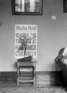 Kitty Brunell's victory in Class 2 at the 1933 RAC Rally. Artist: Bill Brunell.