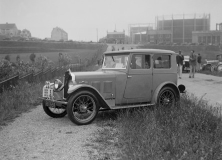 Wolseley Hornet saloon of DEM Douglas-Morris at the B&HMC Brighton Motor Rally, 1930. Artist: Bill Brunell.