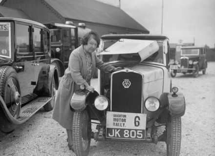 Mrs JW McClintock with her Triumph saloon at the B&HMC Brighton Motor Rally, 1930. Artist: Bill Brunell.