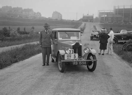 Wolseley Hornet saloon of DEM Douglas-Morris at the B&HMC Brighton Motor Rally, 1930. Artist: Bill Brunell.