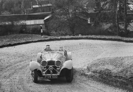 Jaguar SS 100 of CJ Gibson competing in the RAC Rally, 1939. Artist: Bill Brunell.